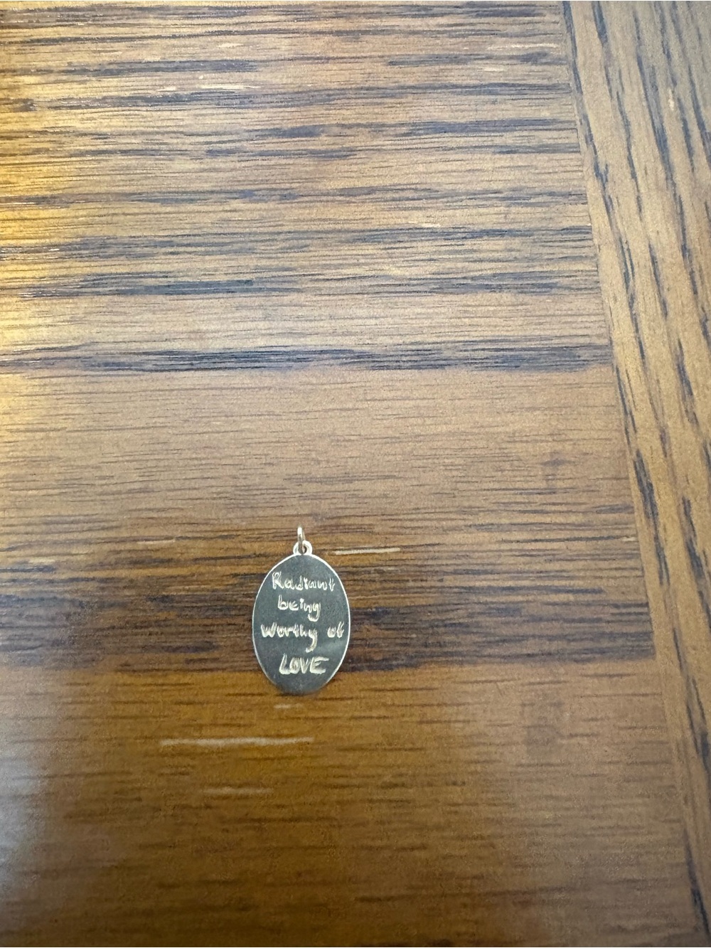 Catbird charm in gold